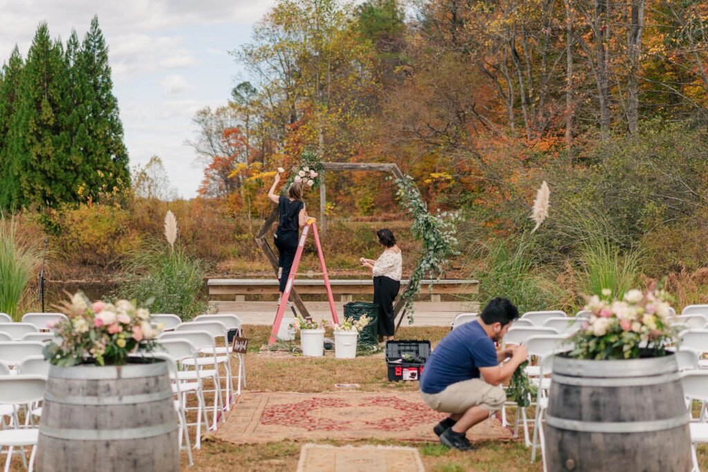 The One Last Avocado floral team working on a wedding setup at Silver Fox Lavender Farm.