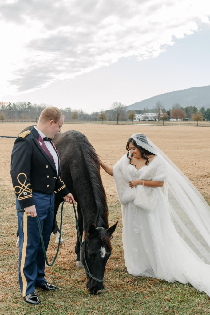 Bride and groom winter wedding with a horse in Crozet Virginia