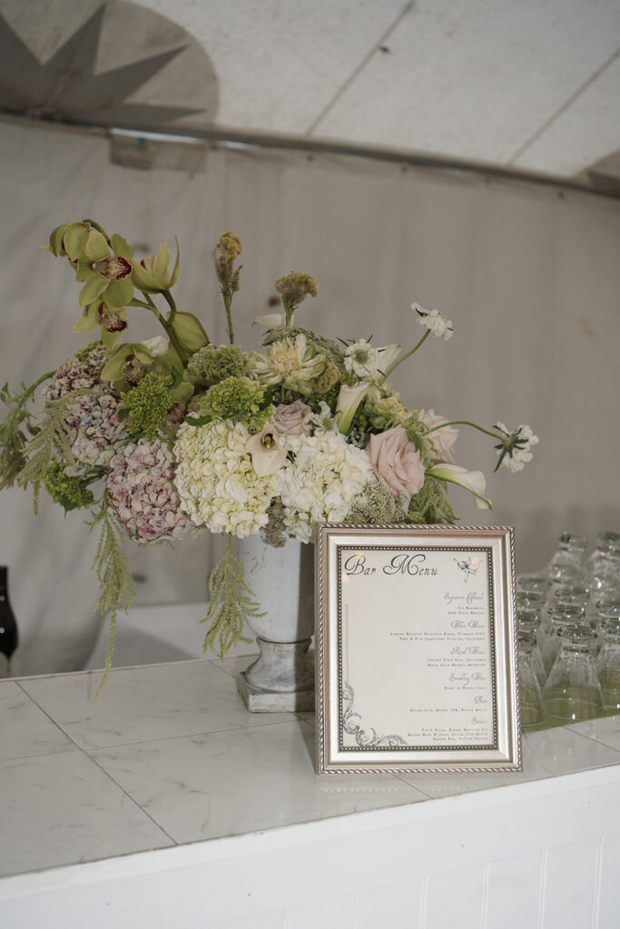 Contemporary floral styling for sailcloth tent wedding in Charlottesville Virginia
